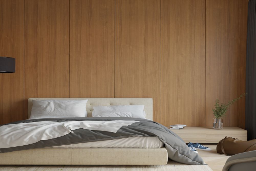 Minimal bedroom with panel wall behind bed